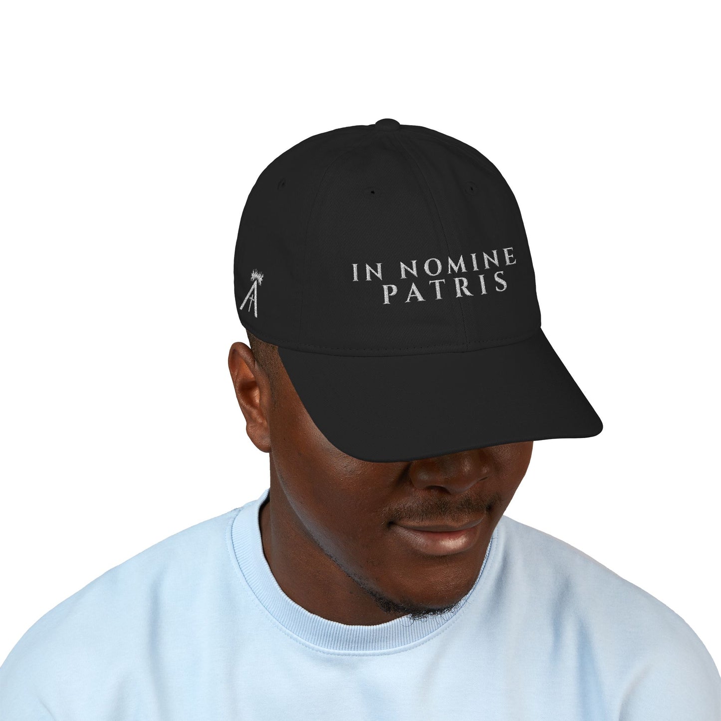 Agnus Co. In Nomine Patris black Catholic cap worn by model — side profile view