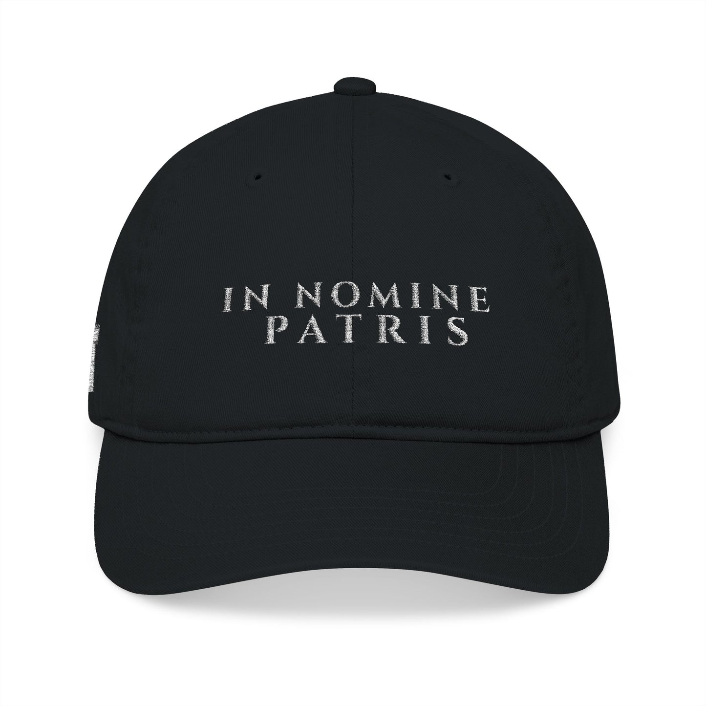 Agnus Co. In Nomine Patris black Catholic cap — front view with Latin embroidery
