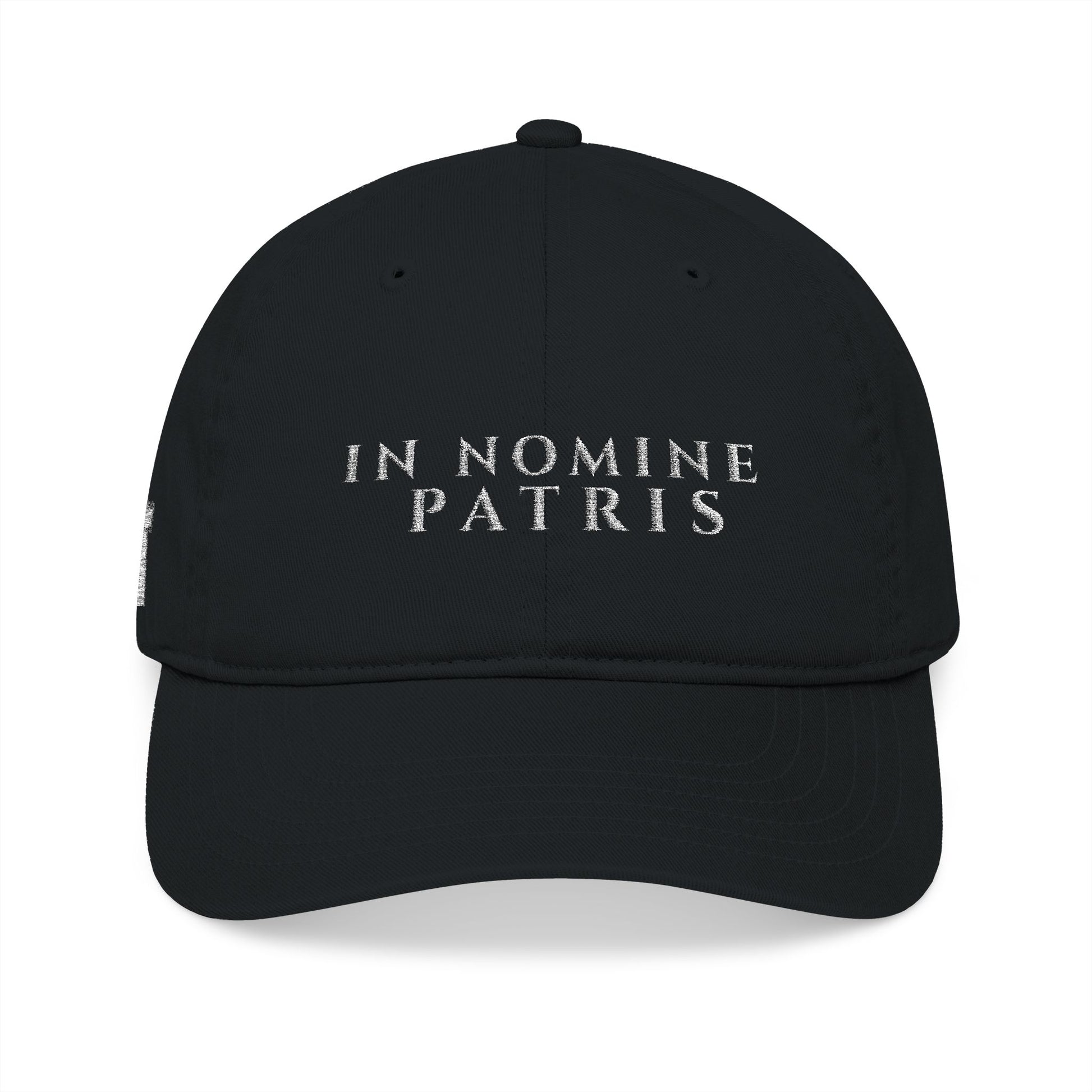 Agnus Co. In Nomine Patris black Catholic cap — front view with Latin embroidery