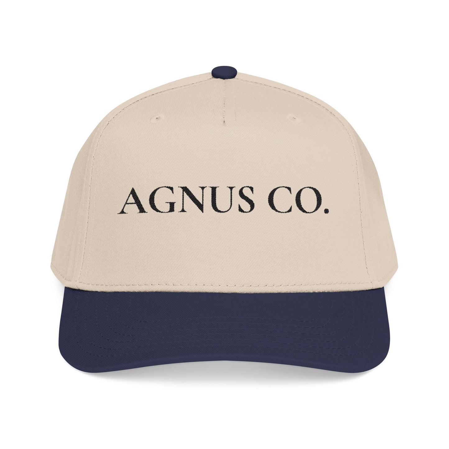 Agnus Co. Navy and Natural two-tone Catholic cap — front view with Agnus Co. text embroidery